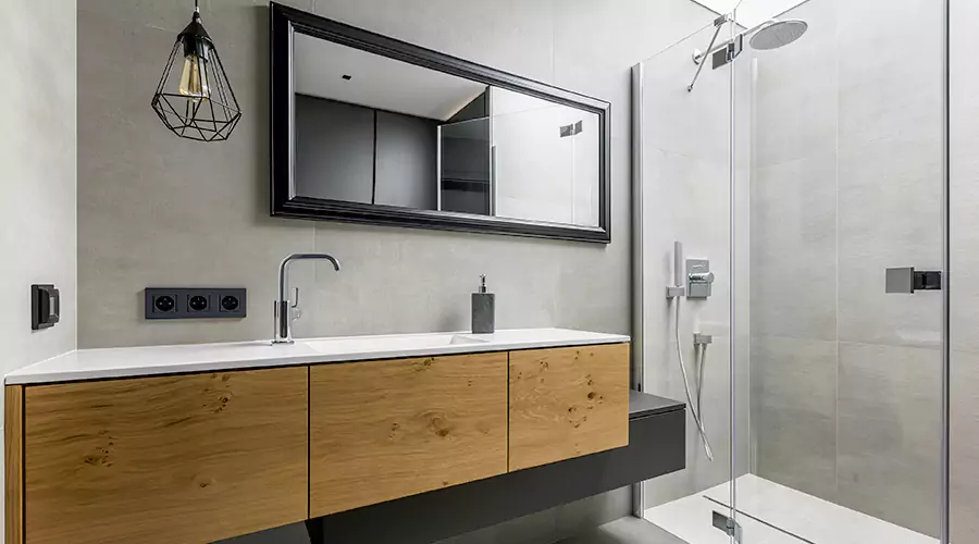 Large luxury master bathroom renovation featuring vaulted ceilings with skylight, freestanding soaking tub, rustic wood accent walls, and a teal tile walk-in shower